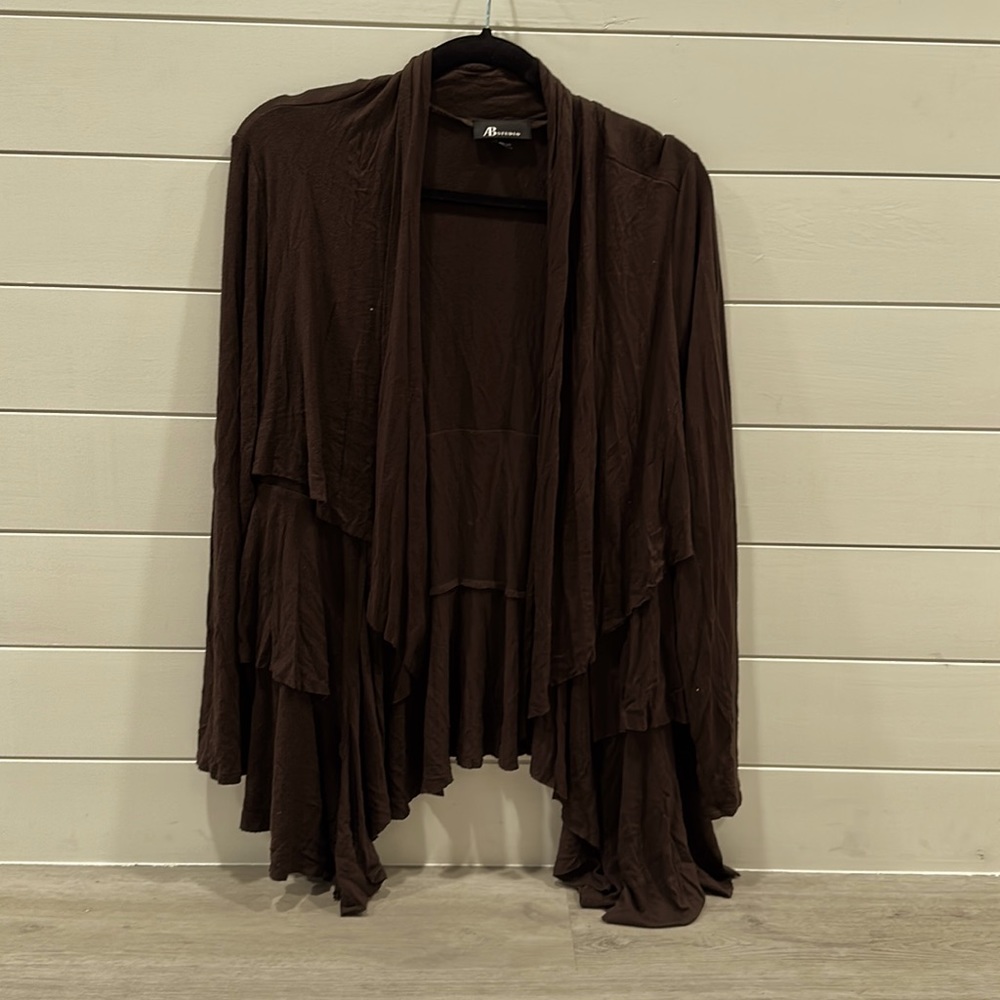 Layered deep brown cardigan.